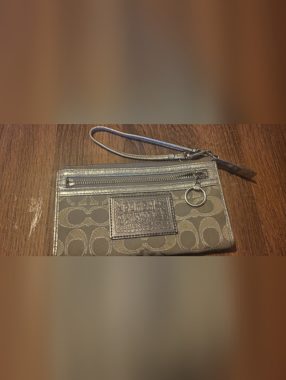 COACH Poppy Metallic Silver Wristlet